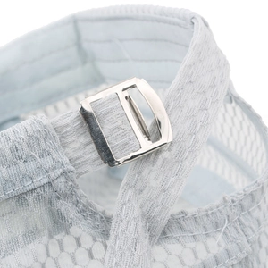 Detail of light blue mesh fabric and adjustable metal buckle on a summer flat top military hat