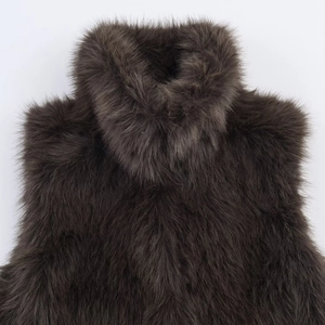 Fashionable dark brown faux fur vest for women featuring thick texture and round neckline