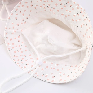 Infant cotton sun hat with cherry print and adjustable windproof strap in cream white