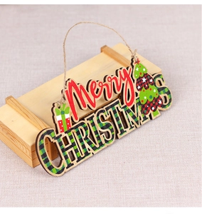 Detail of wooden Merry Christmas hanging sign with 3D layered letters and hemp rope