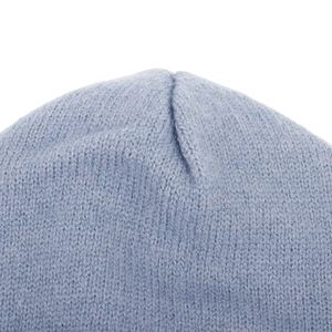 Detailed close-up showing knitting texture and top stitching of blue winter scarf hat
