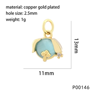 Detail view of 18K gold plated copper puppy pendant with blue opal and white crystals