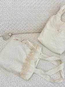 Creamy white canvas tote bag with lace trim and tassel, elegant high-capacity shoulder bag