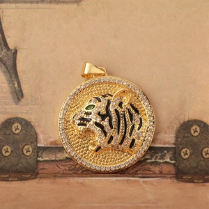 Golden round tiger head pendant with black stripes and green zircon eyes on jewelry chain