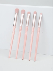 Detail of pink diamond-cut handles on a 5-piece professional eye makeup brush set