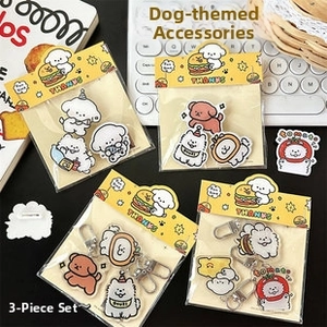 Détail d'accessoires de dessin animé de chien avec broches en acrylique et porte-clés