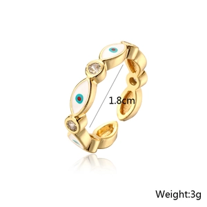 Detail of 18K gold plated eye ring with blue enamel, zircons and size measurements