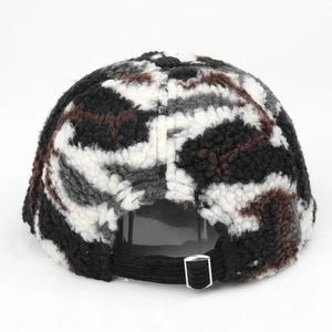 Winter plush camouflage baseball cap with warm fleece texture and adjustable buckle