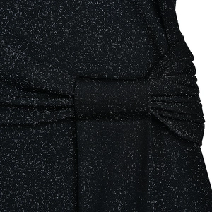 Detailed macro shot of black glitter fabric with elegant pleated texture on the dress