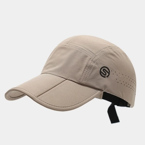 Detail of light khaki quick-dry baseball cap showing center fold design and side laser vents