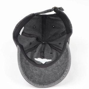 Detail view of washed cotton baseball cap interior with sweatband and metal buckle