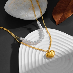 Double-layered titanium steel heart necklace with pearls and gold checkerboard pendant