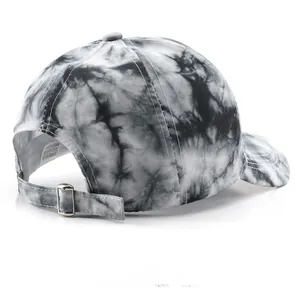 Rear view of tie-dye baseball cap featuring metal buckle and polyester fabric detail
