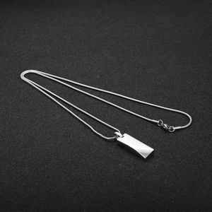 Minimalist silver titanium steel necklace with a sleek bar pendant and snake chain