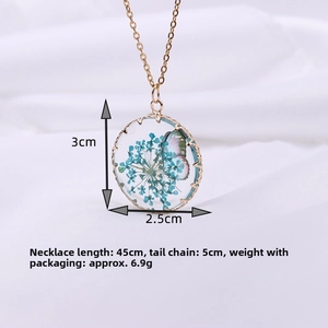 Detail of butterfly and dried flower glass pendant showing size 3x2.5cm and 45cm chain