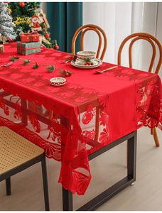 Lace red Christmas tablecloth with Santa and snowman patterns and wavy lace edges