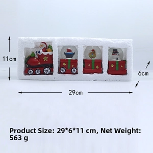 Detailed view of resin Christmas train set with dimensions in foam packaging