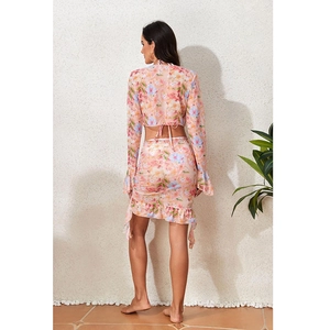 Floral print two-piece swimsuit set with long flare sleeves and ruffled skirt back view