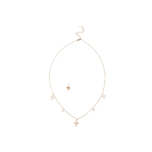 Minimalist gold zircon cross necklace and stud earrings set on a clean white background