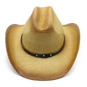 Classic straw cowboy hat with leather band and turquoise beads on white background