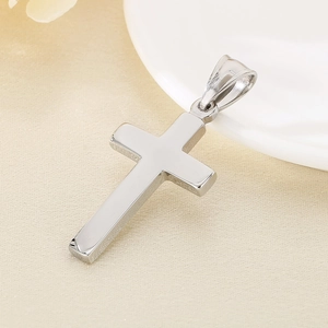 Polished silver stainless steel cross pendant with high-shine mirror finish and top ring