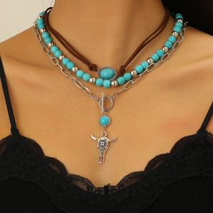Set collana bohémien multistrato con ciondolo turchese e teschio di toro argento