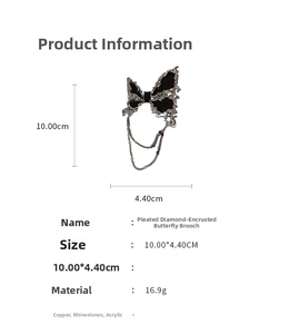 Détail broche papillon avec dimensions 10x4,4cm en cuivre et strass brillants
