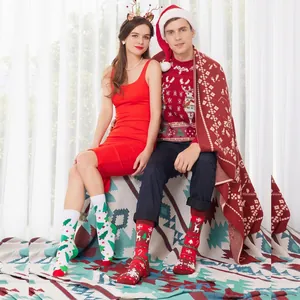Festive Christmas crew socks featuring reindeer and tree patterns for men and women