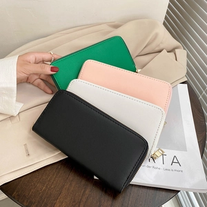 Minimalist long PU leather zip wallet for women in multiple colors with lychee texture