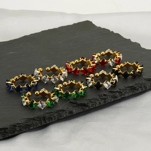 Adjustable gold plated titanium steel rings with multi-color zircon stones on black slate