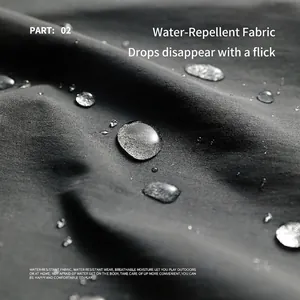 Waterproof dark grey apron fabric with water droplets showing hydrophobic breathable texture