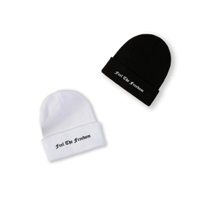 Winter knit beanies in black and white featuring Feel The Freedom gothic embroidery