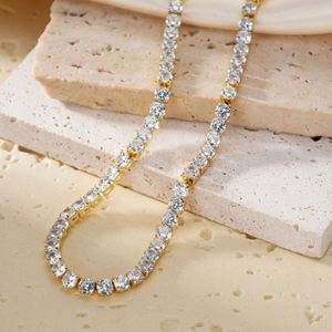 Elegant gold-plated tennis necklace featuring round-cut sparkling cubic zirconia stones