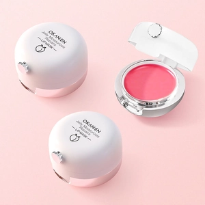 Moisturizing peach jelly lip mask set in spherical white packaging on pink background