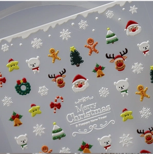 Detailed 3D embossed Christmas nail stickers featuring Santa, reindeer, and snowflakes
