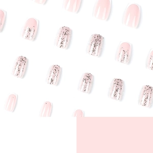 White French tip press-on nails with silver glitter accents and soft pink base set