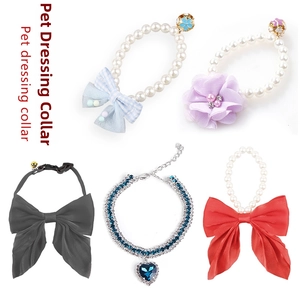 Adjustable pearl pet collars with ribbon bows, floral accents and heart pendant charms