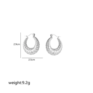Detailed view of silver croissant twist hoop earrings with size and weight dimensions