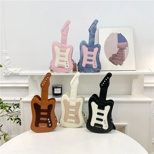 Creative guitar-shaped crossbody bags for women with metal star decor and chain straps