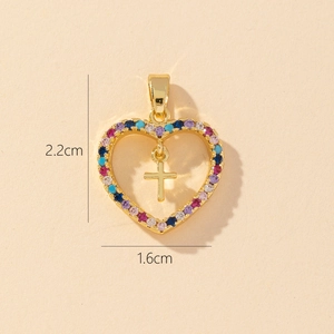 Detailed size view of a 2.2cm heart pendant with colored stones and a gold cross