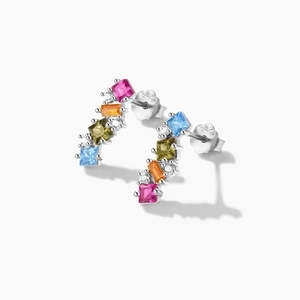 Macro detail of S925 sterling silver earrings with vibrant multi-colored gemstones