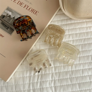 Elegant tortoiseshell acetate hair claws for women in premium beige and brown patterns