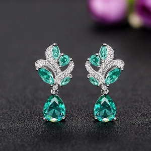 Elegant pear-cut green gemstone earrings with sparkling white zircon accents and silver base