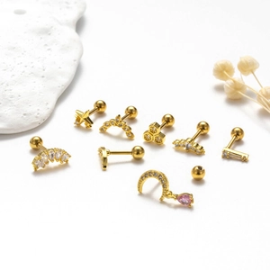 Golden stainless steel stud earring set with zircons in star and moon designs
