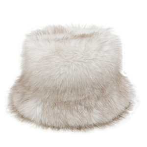 Detail shot of plush faux fox fur texture on a cream winter bucket hat for women