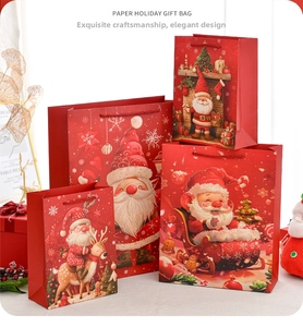 Four different sizes of Santa Claus gift bags with red woven handles and festive patterns
