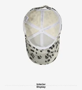 Interior display showing 100% cotton material and stitching of the leopard baseball cap