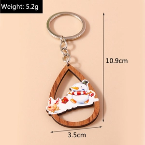 Vue détaillée du porte-clés de Noël en bois en forme de larme avec ses dimensions