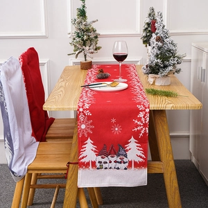 Christmas table runner with gnome and snowflake patterns for festive holiday home decor