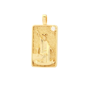 Close-up of gold tarot pendant featuring Magician design with a clear zircon inlay